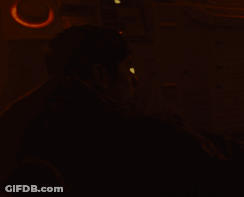 A Man In A Dark Room With The Words " Yo Hop On League " On The Bottom GIF
