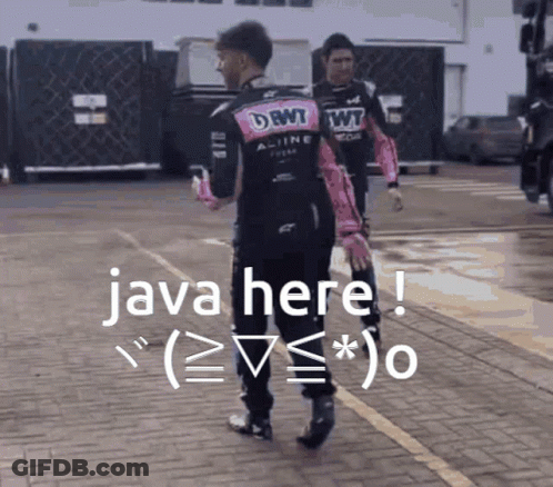 A Man In A Dbwt Alpine Racing Uniform Talks To Another Man In A Parking Lot GIF