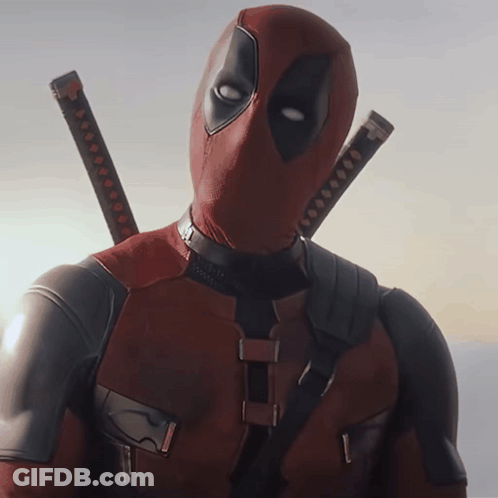 A Man In A Deadpool Costume Has Two Swords Hanging From His Neck GIF