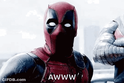 A Man In A Deadpool Costume Is Giving A Thumbs Up And Says Awww . GIF