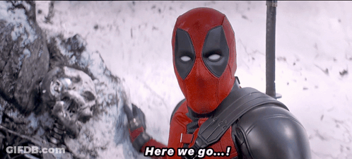 A Man In A Deadpool Costume Says " Here We Go ... " GIF