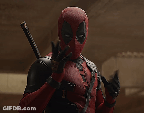 A Man In A Deadpool Costume With A Sword Behind His Back GIF