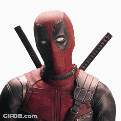 A Man In A Deadpool Costume With Two Swords On His Shoulder GIF