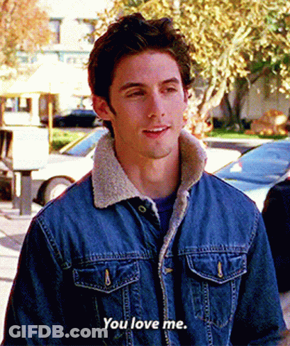 A Man In A Denim Jacket Is Saying You Love Me GIF