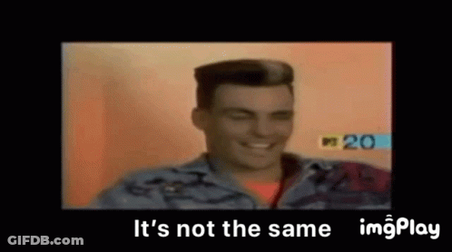 A Man In A Denim Jacket Is Smiling In A Video . GIF