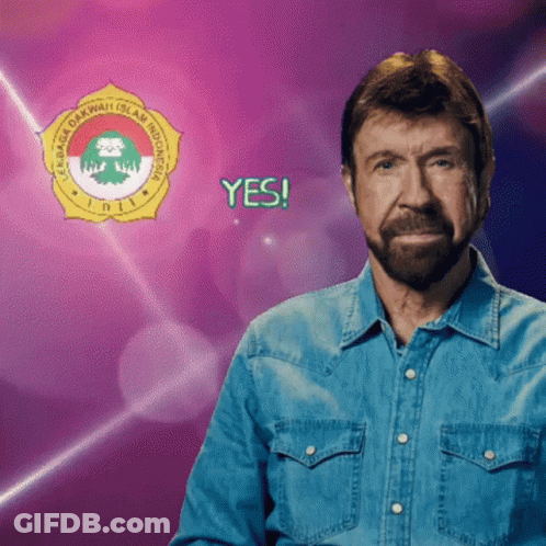 A Man In A Denim Shirt Is Standing In Front Of A Logo That Says Yes GIF