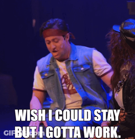 A Man In A Denim Vest Says " Wish I Could Stay But I Gotta Work " On Stage GIF