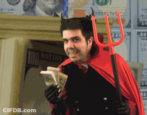 A Man In A Devil Costume Is Holding Money And A Trident In Front Of A Sign That Says 100 Motion GIF