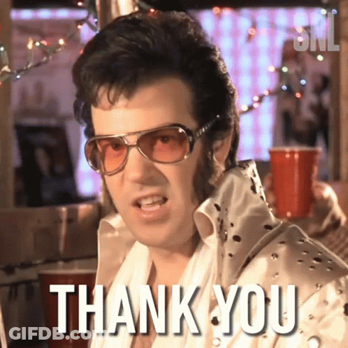 A Man In A Elvis Presley Costume Says " Thank You " GIF