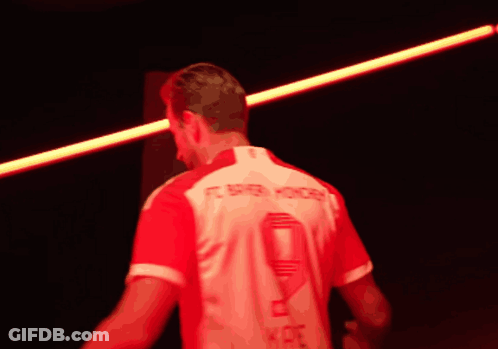 A Man In A Fc Bayern Munchen Jersey GIF