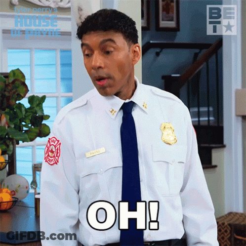 A Man In A Fireman 'S Uniform Says " Oh " GIF