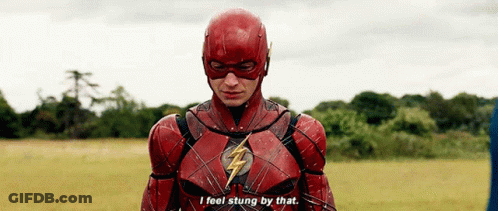 A Man In A Flash Costume Says I Feel Stung By That . GIF