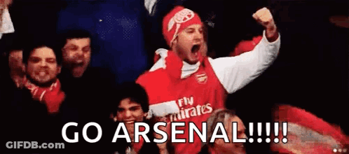 A Man In A Fly Emirates Jersey Is Screaming In The Stands . GIF