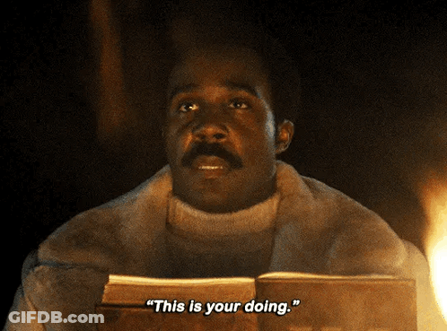 A Man In A Fur Coat Is Holding A Book And Says " This Is Your Doing " GIF