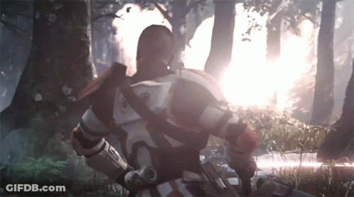 A Man In A Futuristic Armor With The Letter S On His Chest GIF