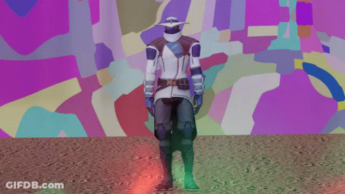 A Man In A Futuristic Outfit Stands In Front Of A Colorful Background GIF