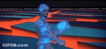Man In Futuristic Suit Holding Blue Object In Maze GIF