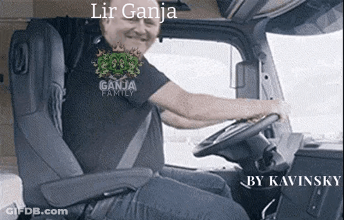 A Man In A Ganja Family Shirt Is Sitting In A Truck GIF