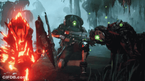 A Man In A Gas Mask Is Holding A Gun GIF