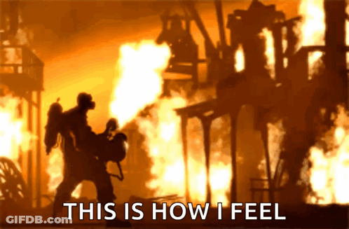 A Man In A Gas Mask Stands In Front Of A Fire With The Words " This Is How I Feel " GIF