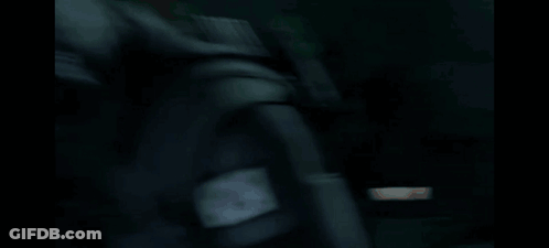 A Man In A Gas Mask Stands In Front Of A Stop Sign That Says He 'S Just Like Me For Real GIF
