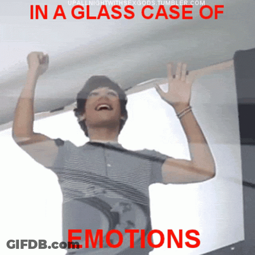 A Man In A Glass Case Of Emotions Laughs GIF
