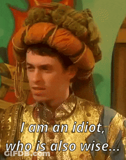 A Man In A Gold And Blue Costume Says I Am An Idiot Who Is Also Wise GIF