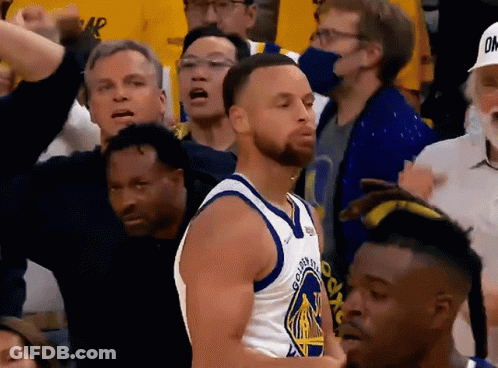 A Man In A Golden State Warriors Jersey Stands In The Crowd GIF