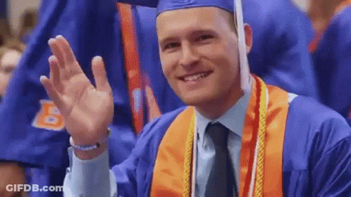 A Man In A Graduation Cap And Gown Waving His Hand GIF