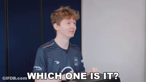 A Man In A Gray Shirt Is Asking Which One Is It GIF