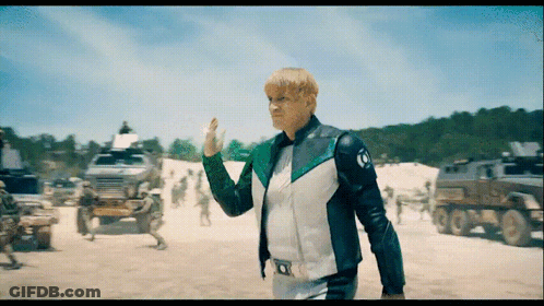 A Man In A Green And White Jacket With The Letter O On The Front GIF