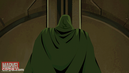 A Man In A Green Cape Is Standing In Front Of A Marvel Sign GIF