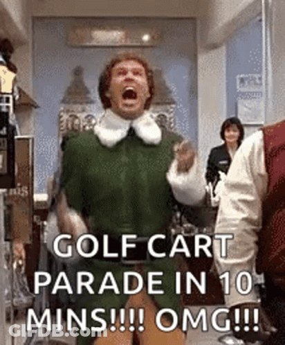 A Man In A Green Elf Costume Is Screaming In A Golf Cart Parade In 10 Mins . GIF