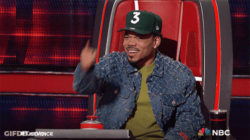 A Man In A Green Hat With The Number 3 On It GIF