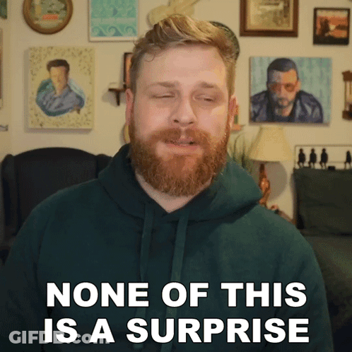 A Man In A Green Hoodie Says " None Of This Is A Surprise " GIF