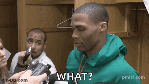 Man In Green Jacket Saying What During Interview GIF