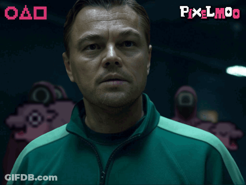A Man In A Green Jacket Is Standing In Front Of A Pixel Moo Logo GIF