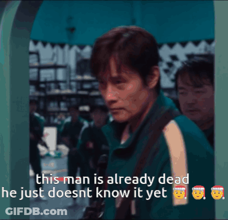 A Man In A Green Jacket Is Talking About A Man Who Is Already Dead GIF