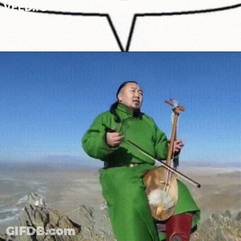 A Man In A Green Jacket Playing A Violin GIF