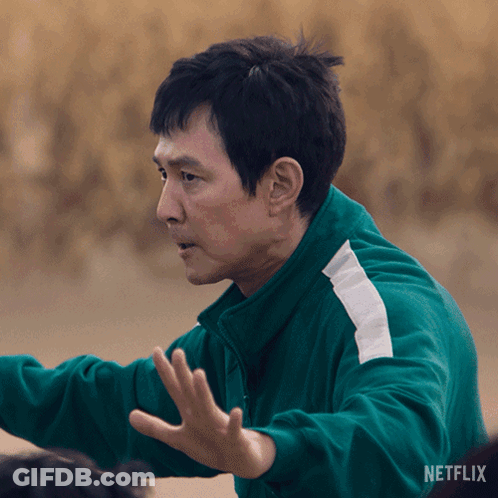 A Man In A Green Jacket With Netflix Written On The Bottom Of The Screen GIF