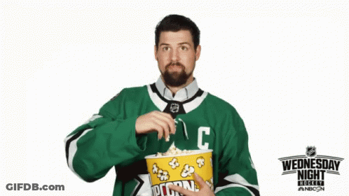 A Man In A Green Jersey With The Letter C On It GIF