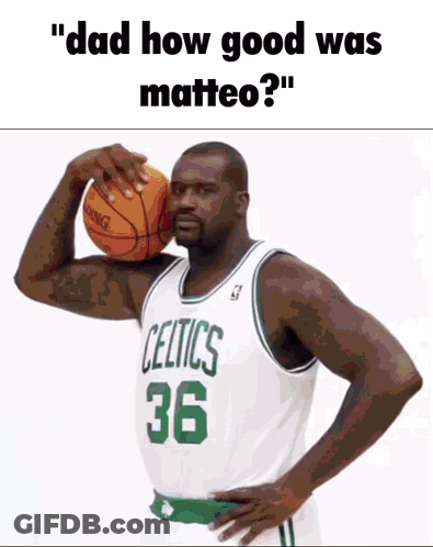 A Man In A Green Kick Jersey Sits In A Chair On A Basketball Court GIF