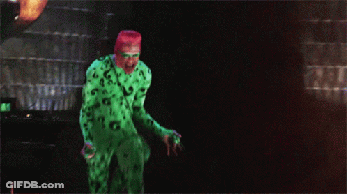 A Man In A Green Question Mark Costume GIF