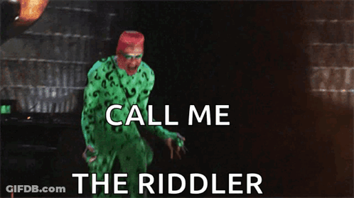 A Man In A Green Riddler Costume Is Screaming And Says Call Me The Riddler GIF