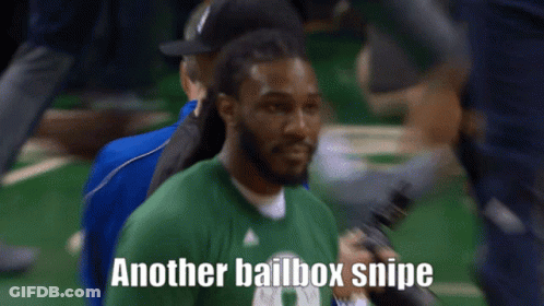 A Man In A Green Shirt Holds A Microphone And Says " Another Bailbox Snipe " GIF