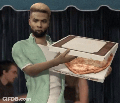 A Man In A Green Shirt Is Carrying A Pizza Box GIF