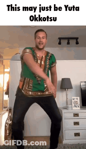A Man In A Green Shirt Is Dancing In A Living Room With The Words This May Just Be Yuta Okkotsu Above Him GIF
