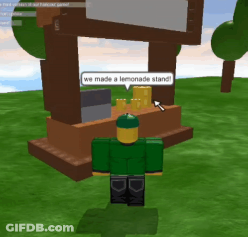 Man In Green Shirt In Front Of Lemonade Stand GIF