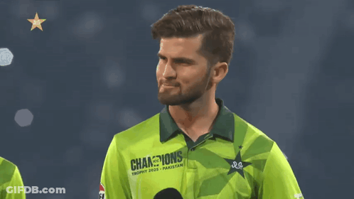 A Man In A Green Shirt That Says ' Champions Trophy 2020 ' On It GIF