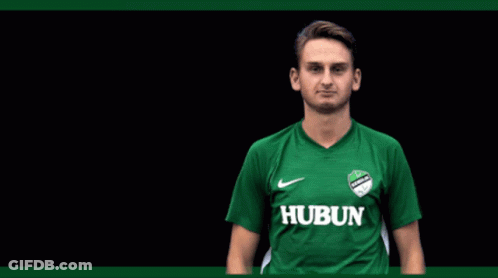 A Man In A Green Shirt With Hubun On It GIF